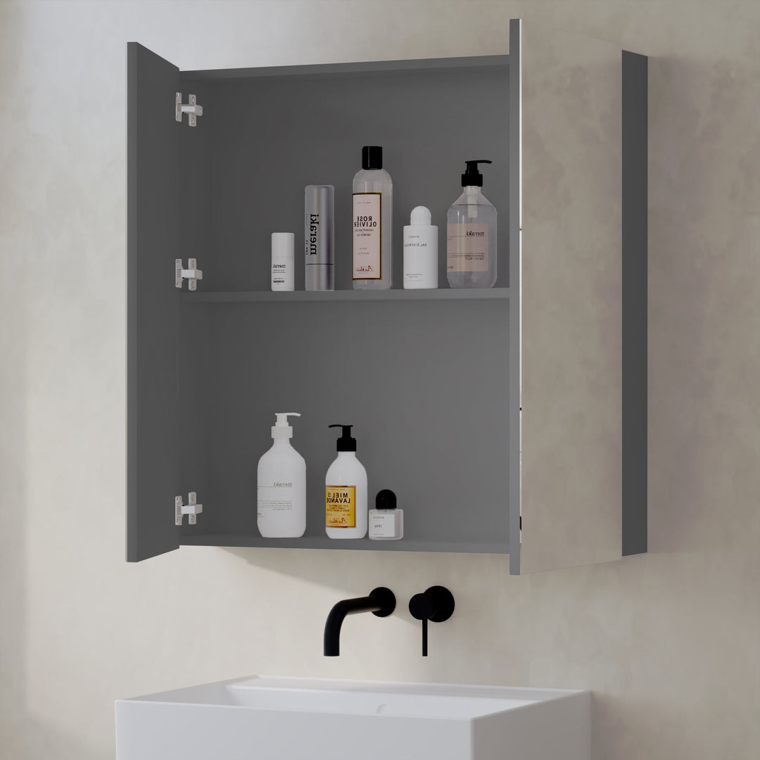 Interior of Lavio mirror cabinet with door open showing storage compartments