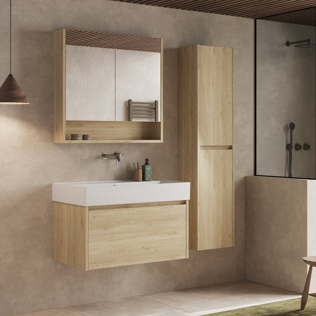 Lifestyle shot of the Mino 800mm vanity unit in natural oak, paired with a matching mirror and styled bathroom accessories, showcasing its modern aesthetic in a contemporary bathroom setting.