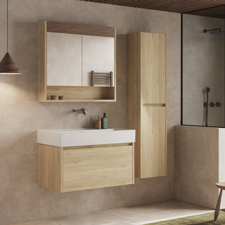 Lifestyle shot of the Mino 800mm vanity unit in natural oak, paired with a matching mirror and styled bathroom accessories, showcasing its modern aesthetic in a contemporary bathroom setting.