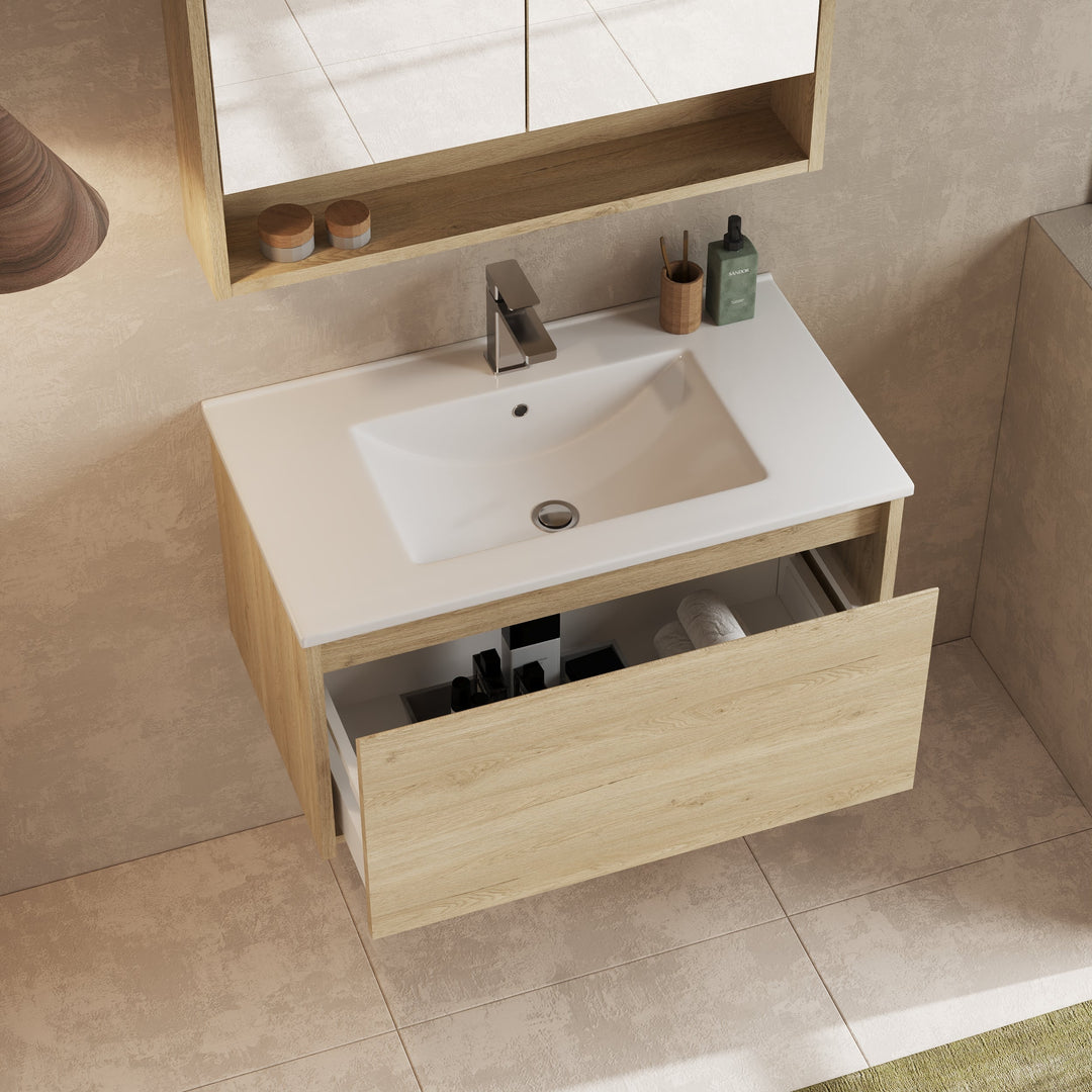 View of the Mino 800mm vanity unit installed in a bathroom setting, paired with a matching mirror.