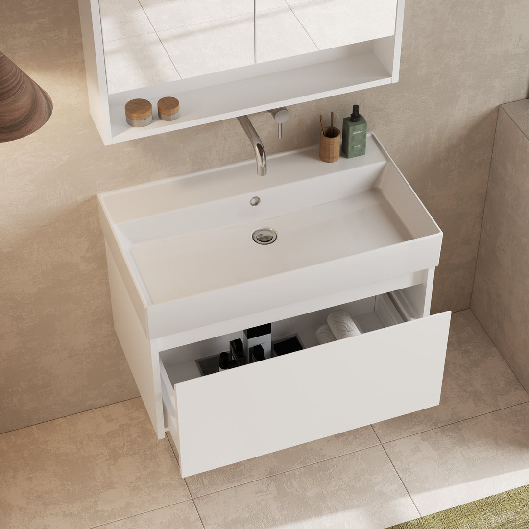 Vanity unit with drawer partially open to display Hettich hinge and metal fitting details.