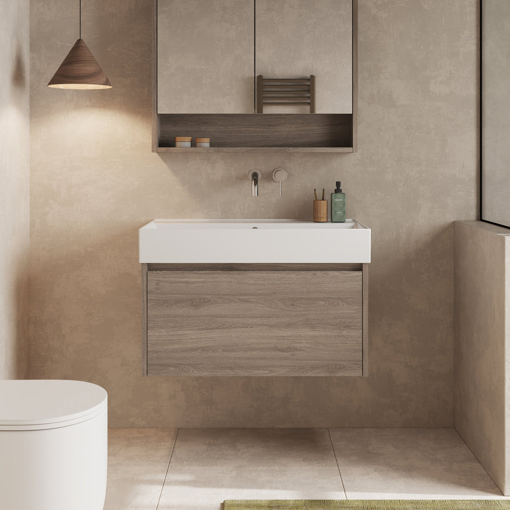 Bathroom setting showing Mino vanity unit in Nebraska Oak under mirror, with side elements
