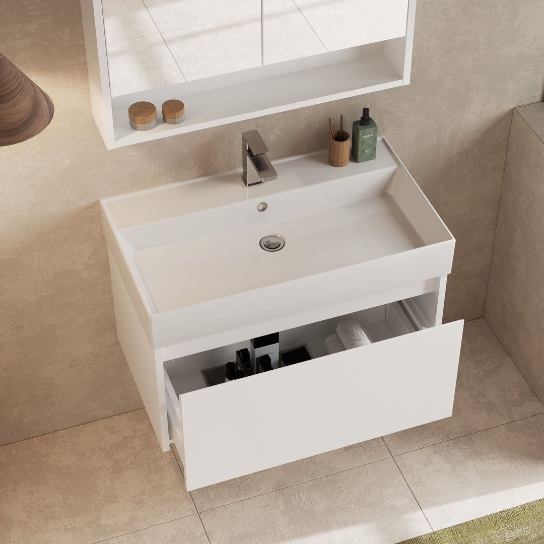 Angled corner view highlighting gloss white finish and drawer alignment.