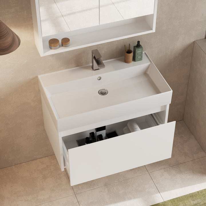 Angled corner view highlighting gloss white finish and drawer alignment.