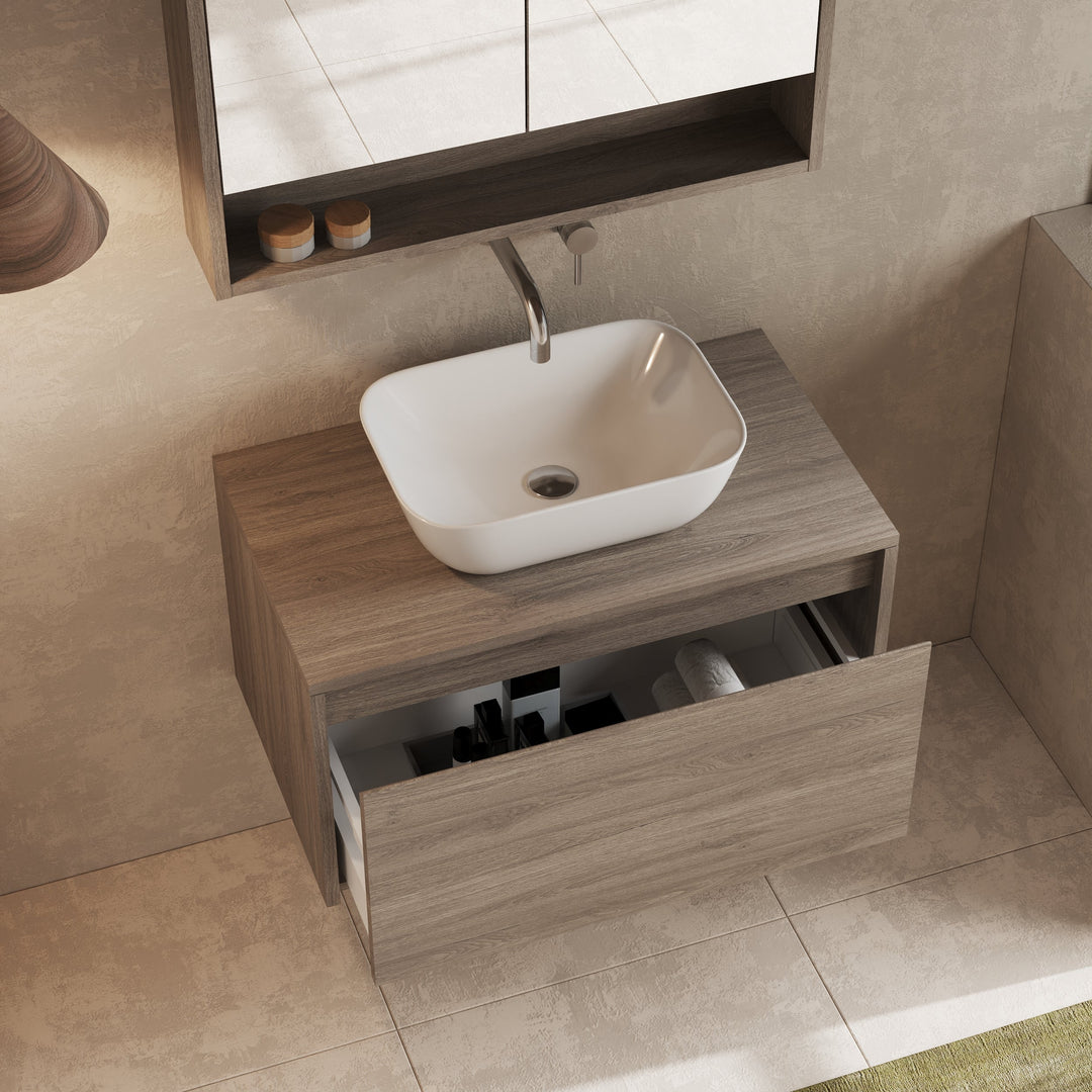 Mino 800 mm wall hung unit with basin above, showing sleek silhouette against tiled wall