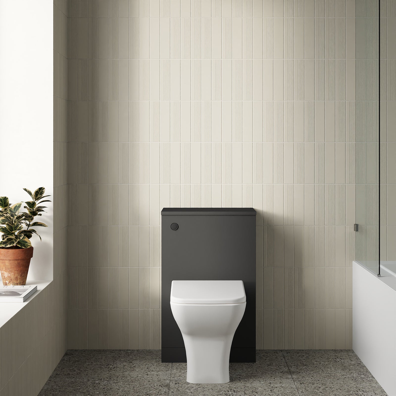 Venti WC toilet cabinet in matt black, front view, installed against a tiled wall